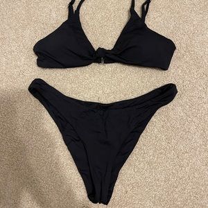Dippin Daisy’s Zen top and Nocturnal bottom in black. Size S.